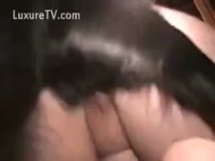 An amateur woman consumes dog flesh.